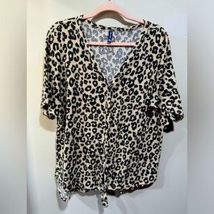 Cheetah print top with buttons down to tie. Comfortable cute spring top!